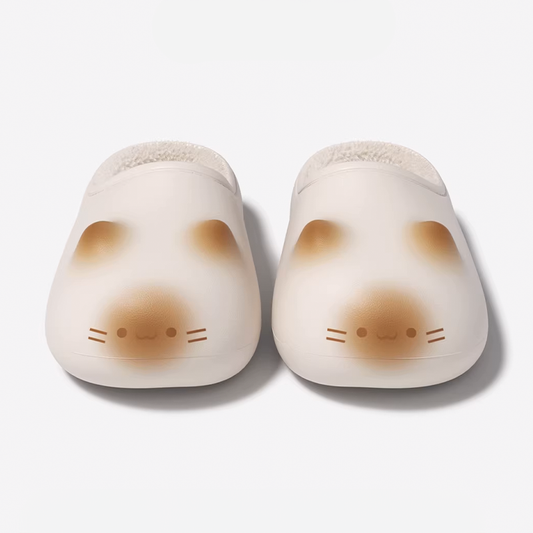 Top-down pair of Cloudsharks Friends cat paw slippers in beige with adorable cat face design, furry lining, and extra-thick cloud cushion sole for all-day home comfort