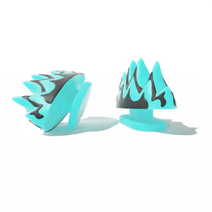 Angled view of Cloudsharks Fire Fin Charms, playful and magical glow-in-the-dark accessories for customizing shark slides.
