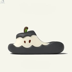 Side view of a sleek black Apple Cloud Slide featuring apple seed graphics, cute cloudsharks style comfortable footwear.