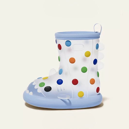 Light blue rainbow dot shark rain boots for kids, playful polka dot pattern with multicolored spots, shark fin details, and breathable waterproof design.