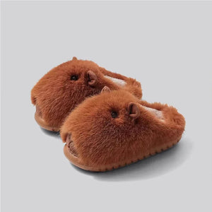 Back angle of capybara slippers by cloudsharks.shop featuring ultra soft plush material and lightweight EVA sole, warm winter house slippers for indoor outdoor use