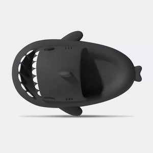 Top down view of black Cloudsharks shark slides showing open toe design, shark teeth, fins, and ergonomic footbed.