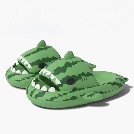 Pair of Watermelon Shark Slides angled to show 3D shark shape, EVA sole, and playful watermelon pattern.