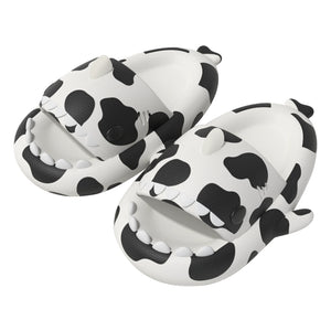 Cow Cloudshark Slides side view - quirky cow print slippers with shark-like design from cloudsharks.shop