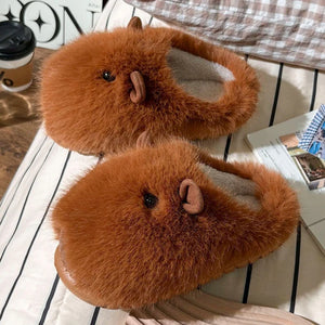 Top view of cute capybara slippers from cloudsharks.shop made with fluffy plush fabric, cozy animal slippers for winter, dorm rooms, and home lounging