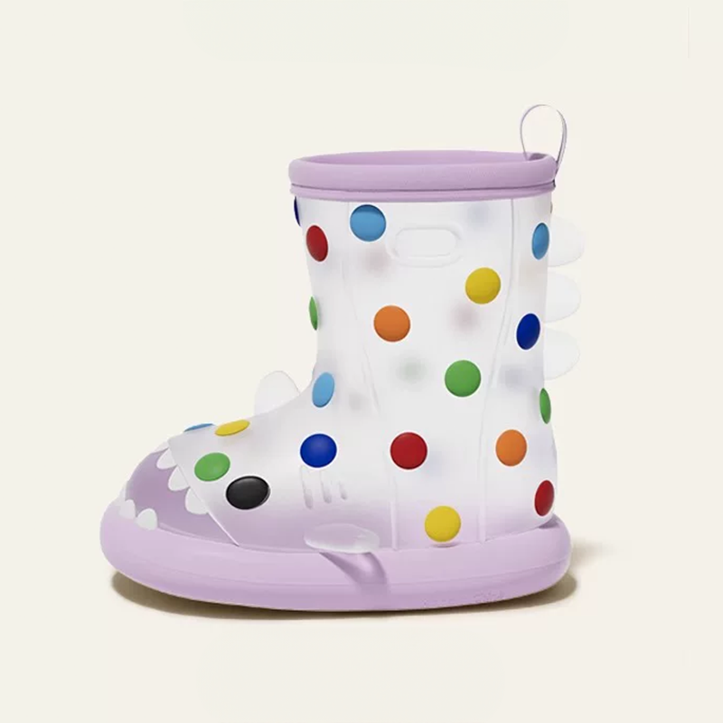Adorable purple rainbow polka dot shark rain boots for toddlers, featuring colorful dots, shark teeth design, and lightweight waterproof material for rainy day play.