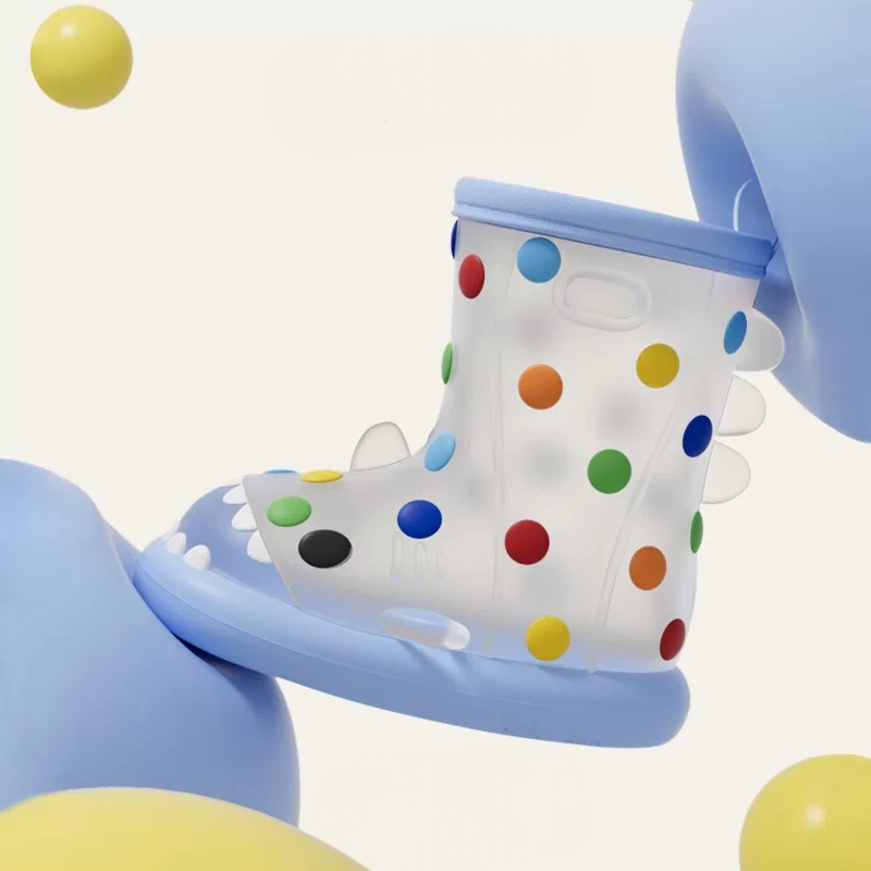Adorable blue rainbow dot polka dot shark rain boots for toddlers, playful colorful multicolored spots (red, blue, yellow, green), cute shark mouth and fin design, lightweight waterproof material floating in fun 3D style – perfect rainy day adventure boots similar to shark slippers or cloudsharks fun footwear.