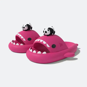 Pair of deep pink Panda Shark Slides with a tiny panda figure on top, sold by cloudsharks.shop. The design is cute and made from thick EVA for a cushioned, cloud-like feel.