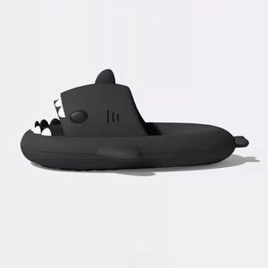 Side profile view of black Cloudsharks showing thick cushioned sole, arch support, and shark fin detail for joint pain relief.