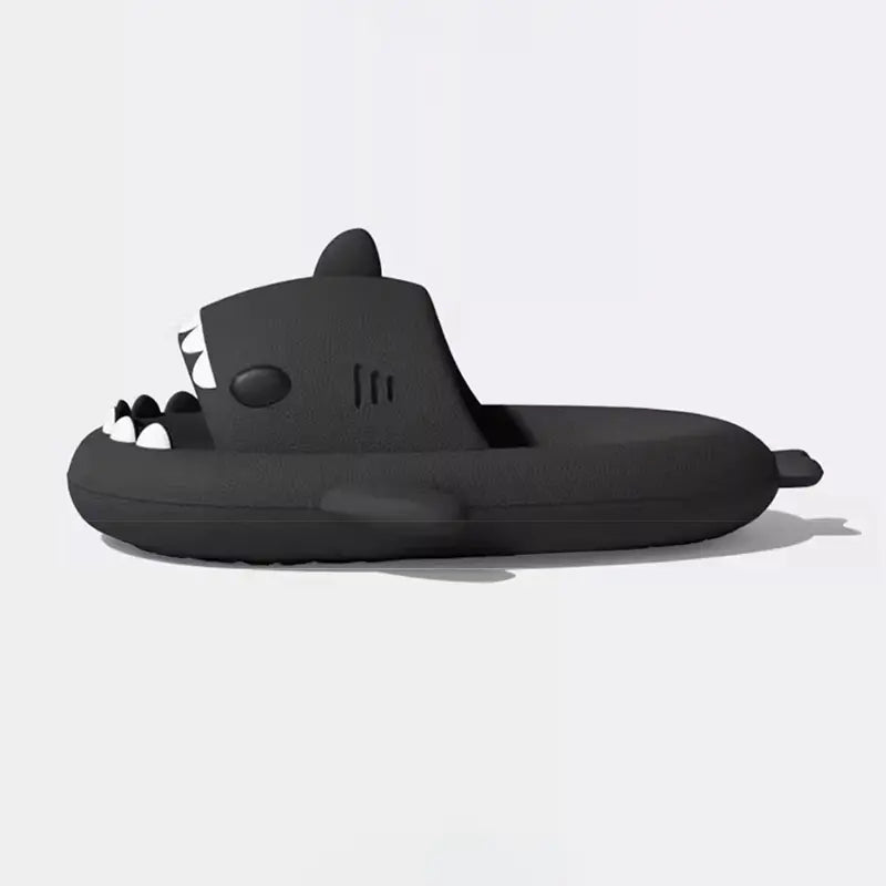 Side profile view of black Cloudsharks showing thick cushioned sole, arch support, and shark fin detail for joint pain relief.