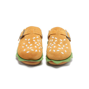 Front-facing view of two burger slippers showing the symmetrical sesame seed embroidery and wide toe box.