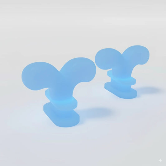 Ocean-blue whale spouting fins accessory for Cloudsharks shark slides, designed to snap on and glow in the dark.