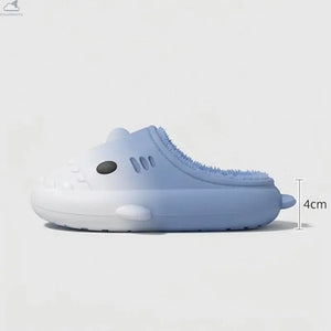 A light blue and white silicone slip-on shoe with a shark design, featuring a textured blue lining and a height measurement indicator showing 4cm.