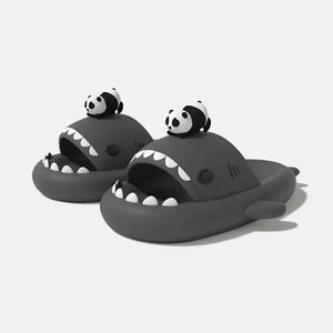 Pair of grey Panda Shark Slides featuring the iconic shark shape, white teeth, and a small panda charm, available at cloudsharks.shop. Durable, non-slip, and perfect for indoor outdoor slides.