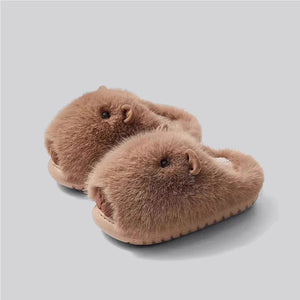 Top angled view of khaki capybara plush slippers by cloudsharks.shop, cozy shark slides style slippers perfect for winter home wear and lounging