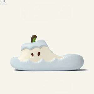 Side view of a light blue Apple Cloud Slide featuring a cream apple core design and stem, soft cloudsharks cushion comfort style.