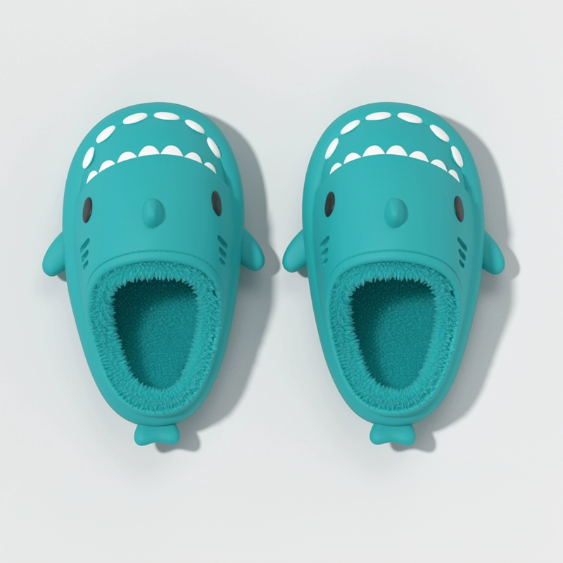 mint green winter shark slides with plush fleece lining, cute cartoon shark slippers made from soft EVA cloudsharks material, warm anti-slip indoor house slippers