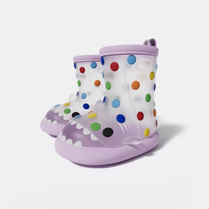 Set of purple rainbow dot shark rain boots for children, transparent polka dots in red, blue, yellow, green, adorable shark mouth, perfect for puddle jumping.