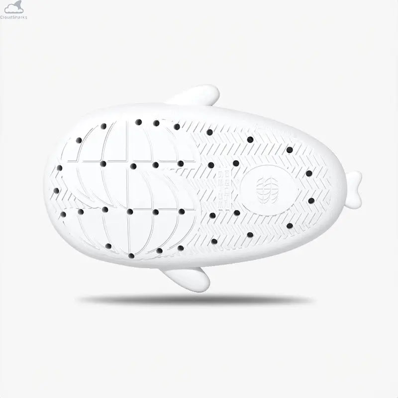 Bottom outsole view of white Cloudsharks Panda Family Shark Slides highlighting the anti-slip tread pattern, flexibility, and cushioned traction design. Bottom view displaying the non-slip outsole pattern of the white Panda Family Shark Slides with drainage holes and textured traction lines.