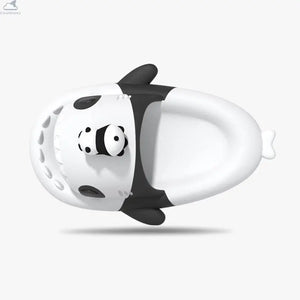 Top view of black and white Cloudsharks Panda Family Shark Slippers showcasing the ergonomic footbed, side fins, shark snout teeth, and mini panda head design. Top-down perspective of the Panda Family Shark Slides displaying the inner footbed, shark fins, panda eye patches, and shark teeth.