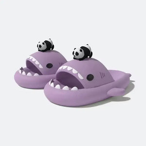Pair of purple Panda Shark Slides, showing the fun, open-mouth shark design and a small panda sitting on the top, exclusively at cloudsharks.shop. Soft sandals and kawaii slippers design.