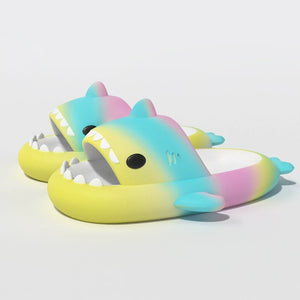 Rainbow gradient shark slides and shark slippers with colorful design, anti-slip technology, and cushioned comfort, perfect for all-day wear from CloudSharks.shop.
