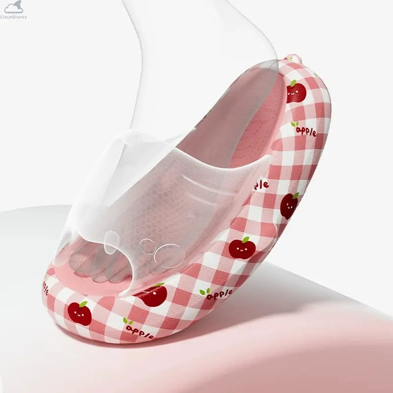 Ergonomic footbed graphic of Sharky Apple shark slippers illustrating cushioned cloudsharks foot support