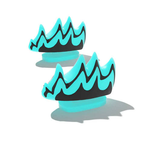 Top view of Cloudsharks Fire Fin Charms, glow-in-the-dark shark slides accessories, perfect for customizing Cloudsharks footwear.