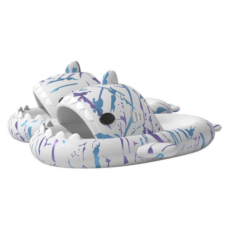 Pair of white Cyberpunk Shark Slides with blue and purple splatter design, showcasing their unique shark shape and comfortable EVA material. Ideal for stylish, casual wear.