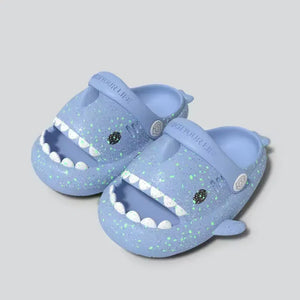 Blue Cloudsharks shark slippers for kids – glow in the dark children’s slides with smiling shark face and soft cushion sole