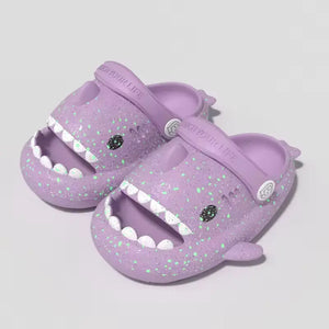 Purple luminous Cloudsharks kids shark clogs – soft EVA glow slippers with cute cartoon face and non-slip design