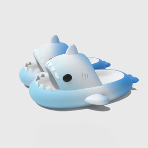 fun and comfy EVA slides with cartoon shark look, ideal for beach or indoor use. shark slides. Shark slides for kids gradient blue color. Cloudsharks